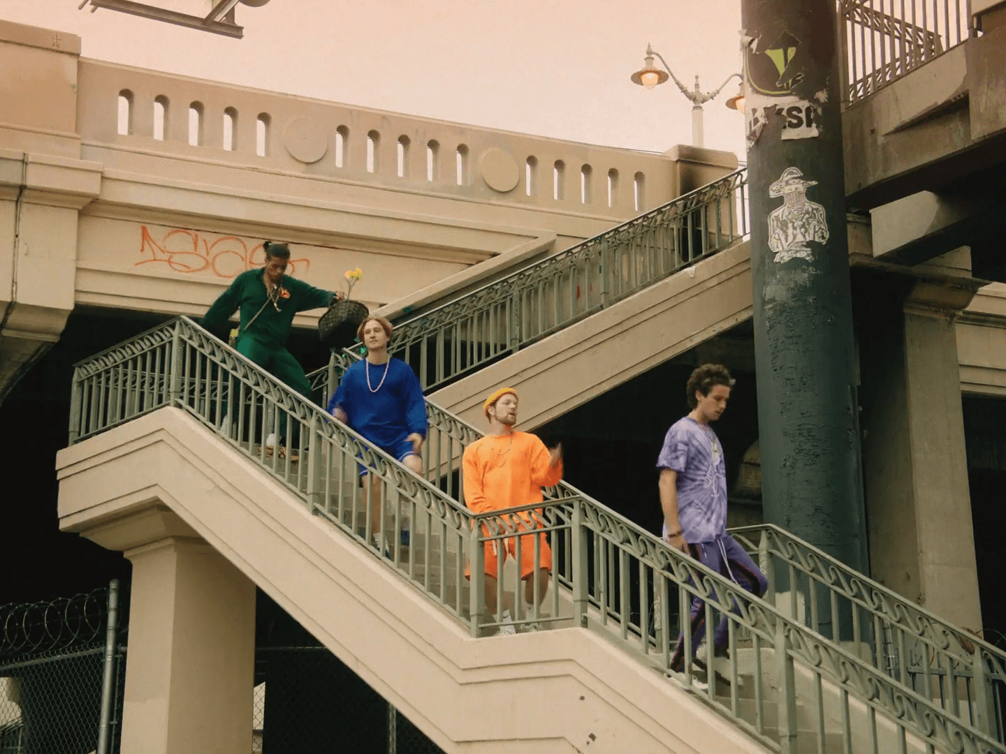 Two white houses nestled in a foggy, mountainous landscape.
