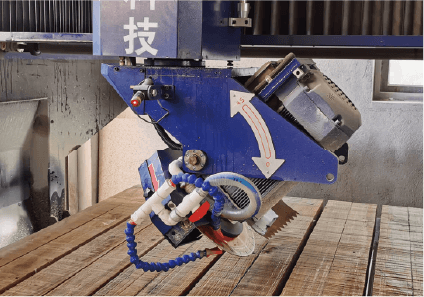 The cutting blade of the Mono-block Bridge Cutting Machine, illustrating its precision in handling various stone materials.