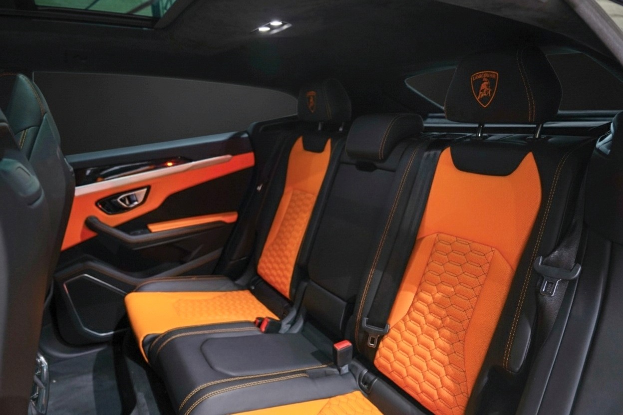 Black Lamborghini Urus 2024 driving in Dubai – super SUV for rent