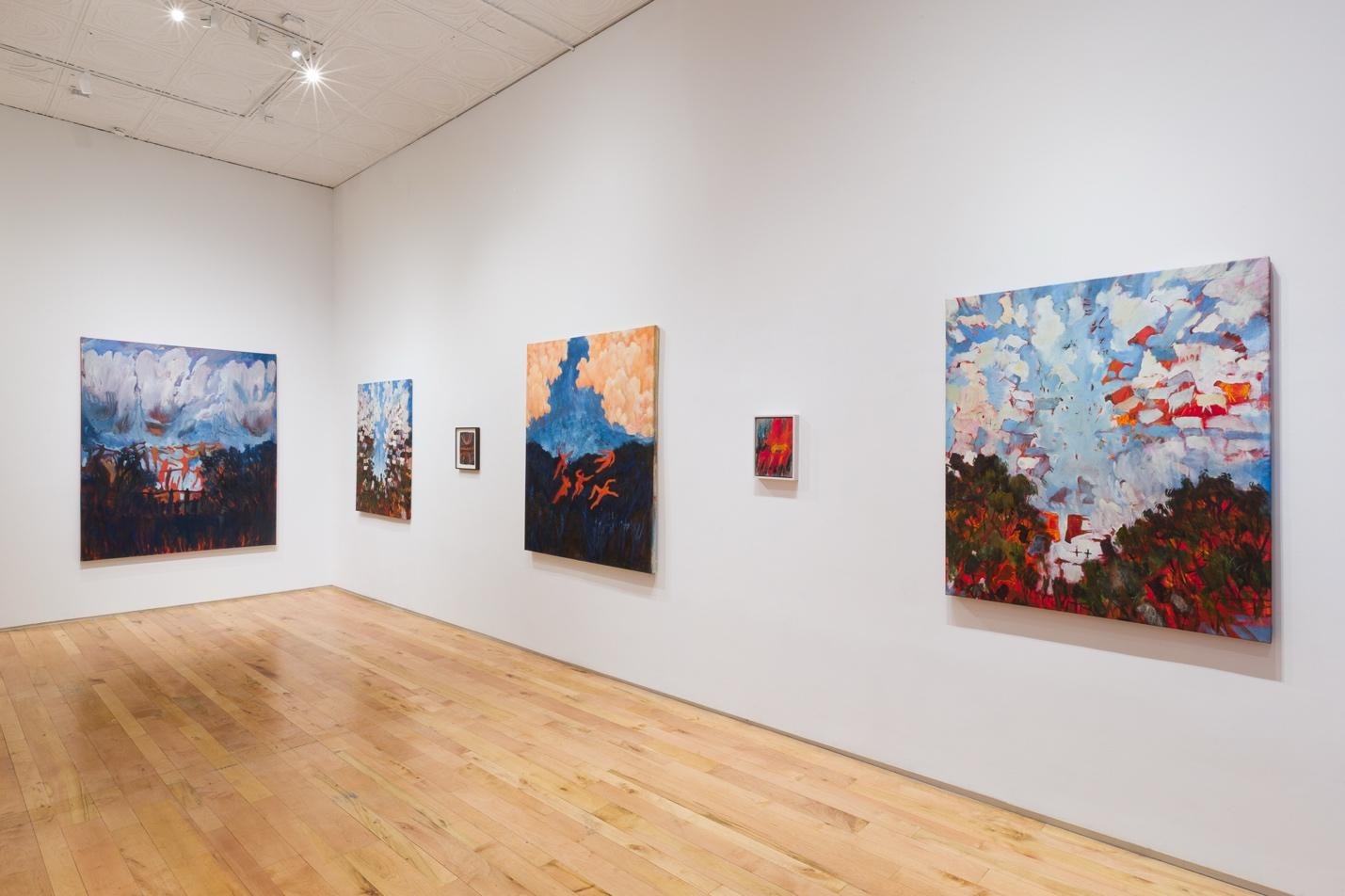 A room with paintings on the wall

AI-generated content may be incorrect.