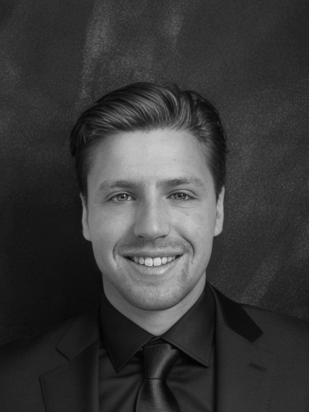 headshot of female in bright background