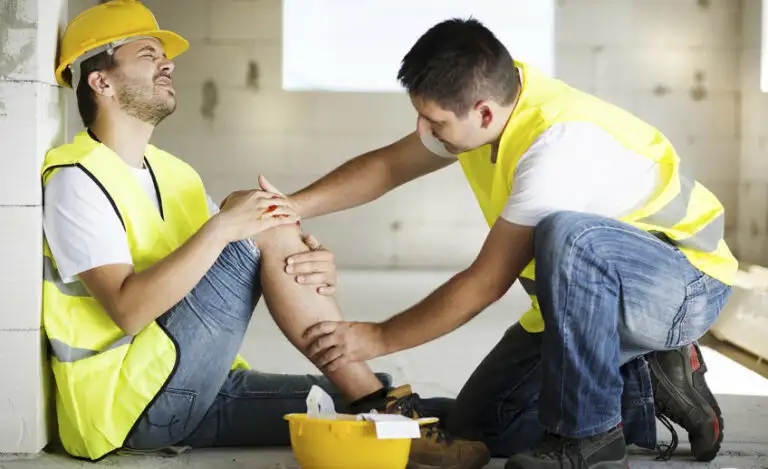 Man Bandaging friend