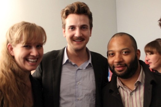 a group photo of two men and a woman