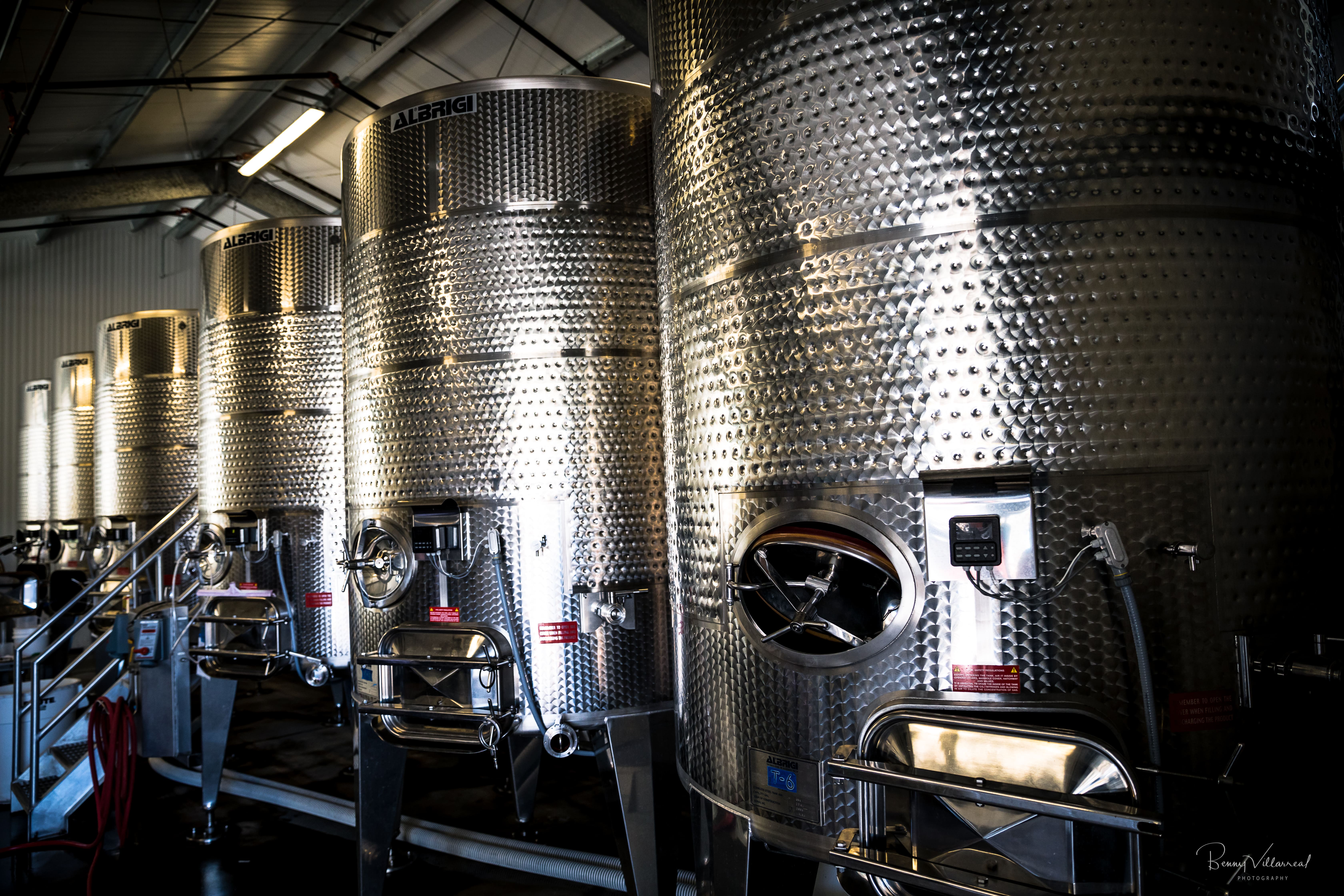 Large wine tanks inside a cellar