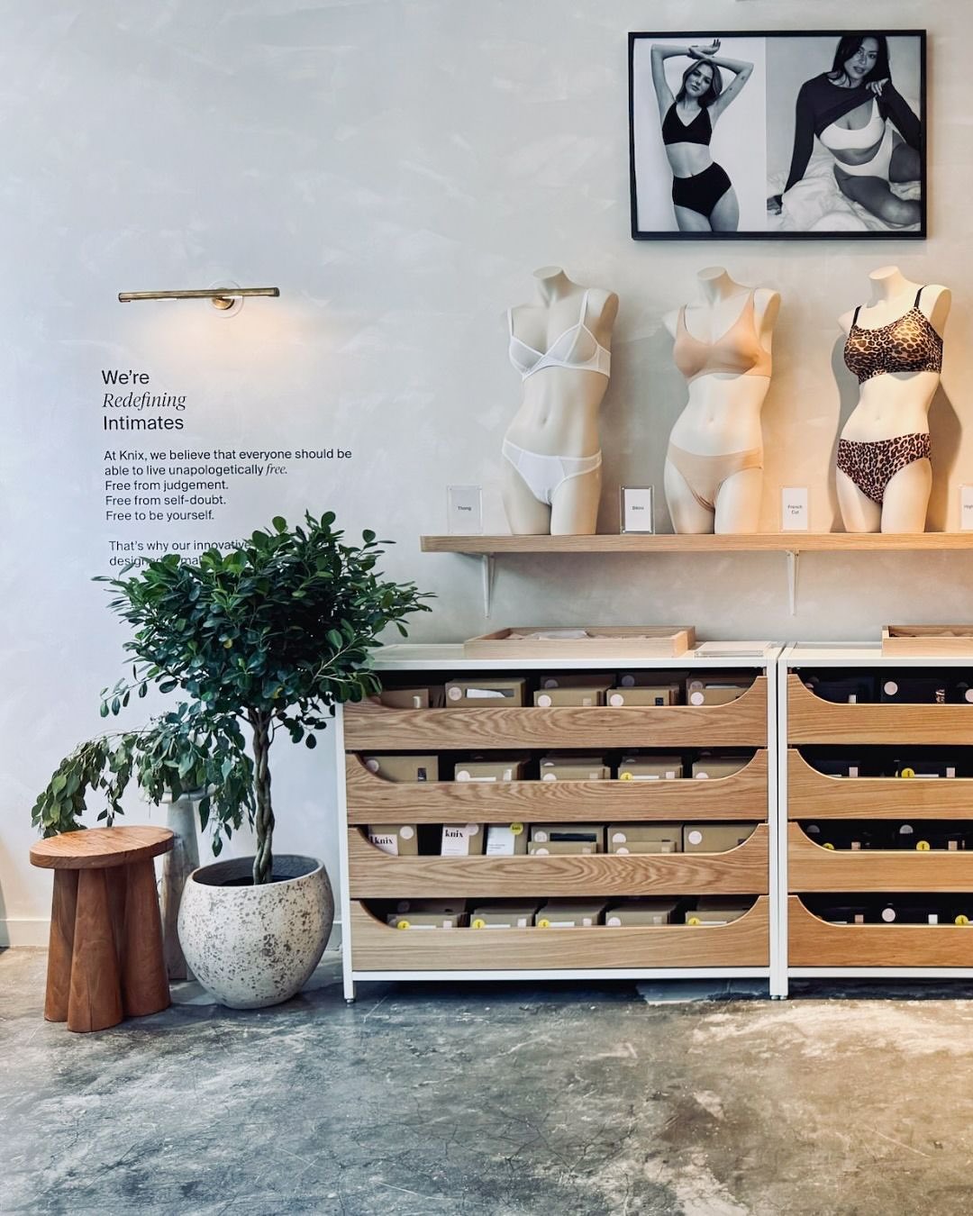 Knix storefront window vinyl graphics displaying campaign imagery on SoHo retail storefront.