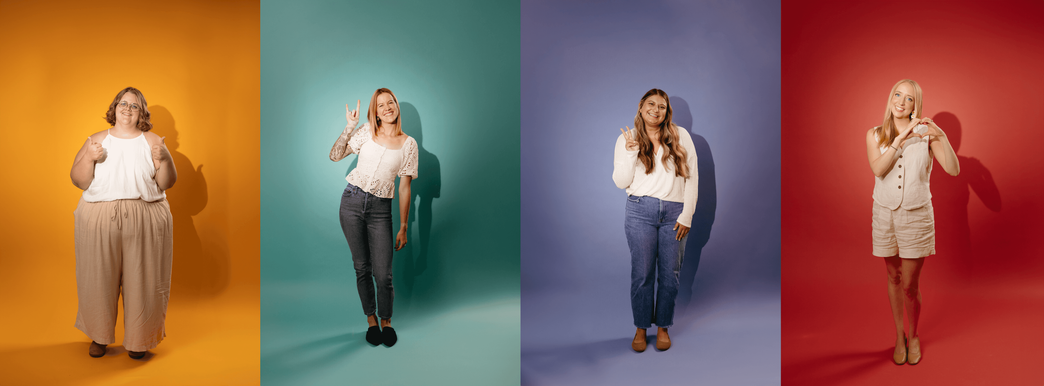 Kidsister's female founders in their photo studio on custom backdrops suited to their favorite color