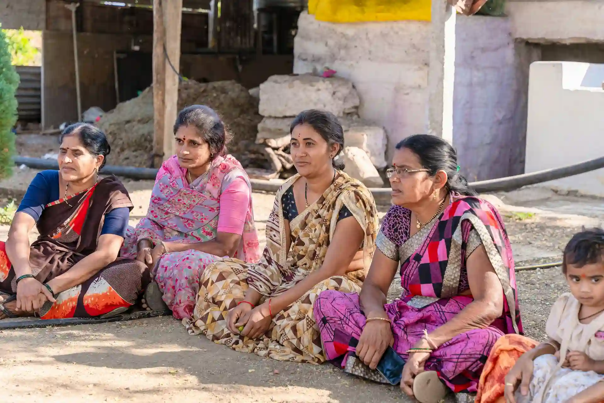 group of childrens sitting on ground
