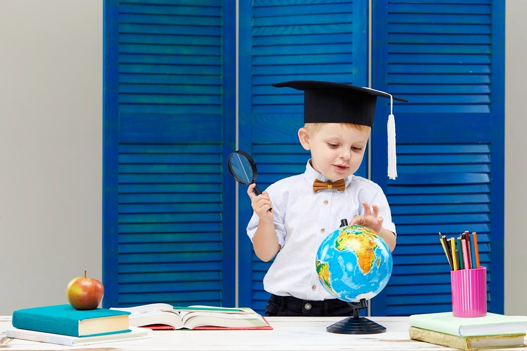 A school building stands against the backdrop of a clear sky