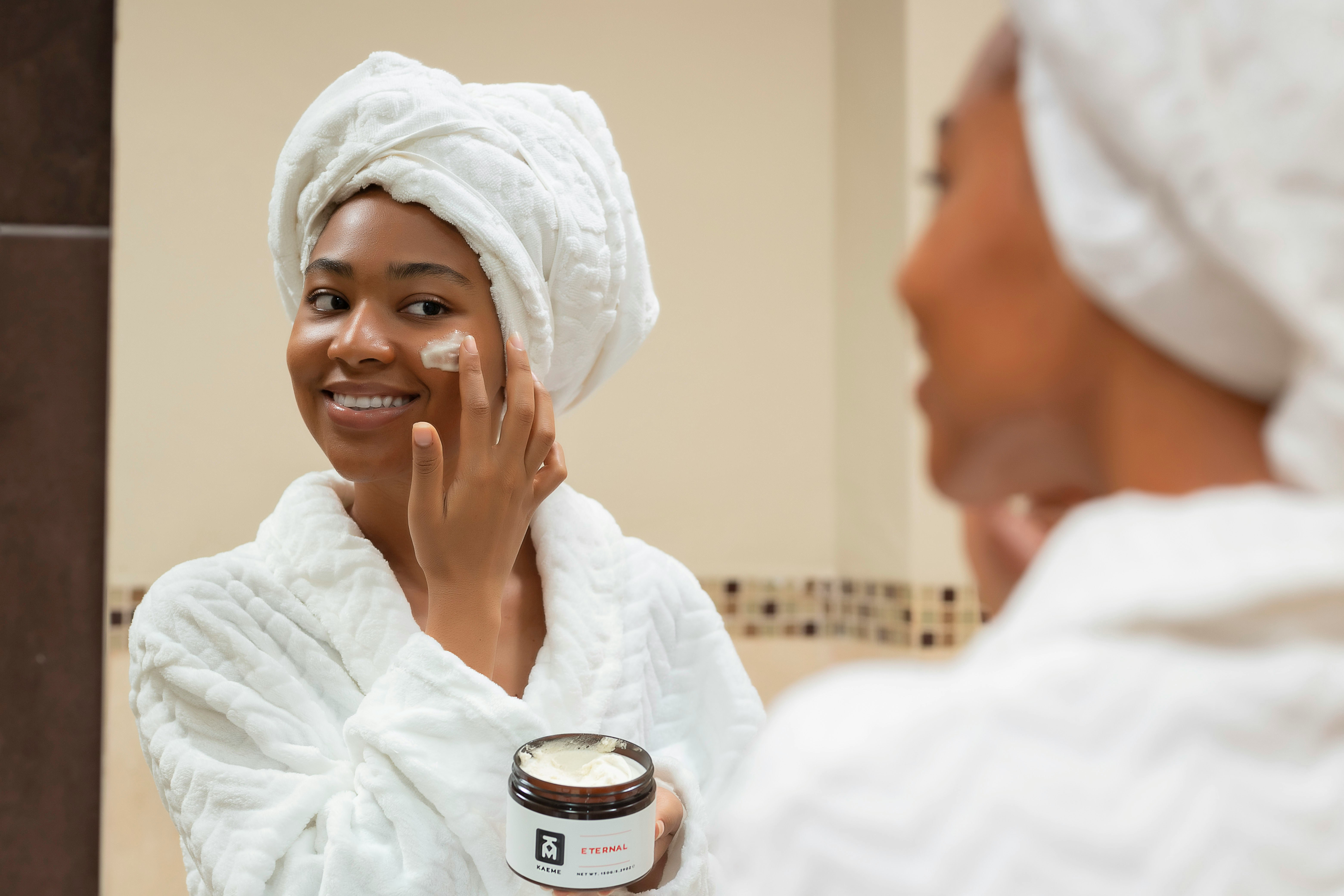 Lady Applying Cream on Face-Skincare Routine For Oily Skin 