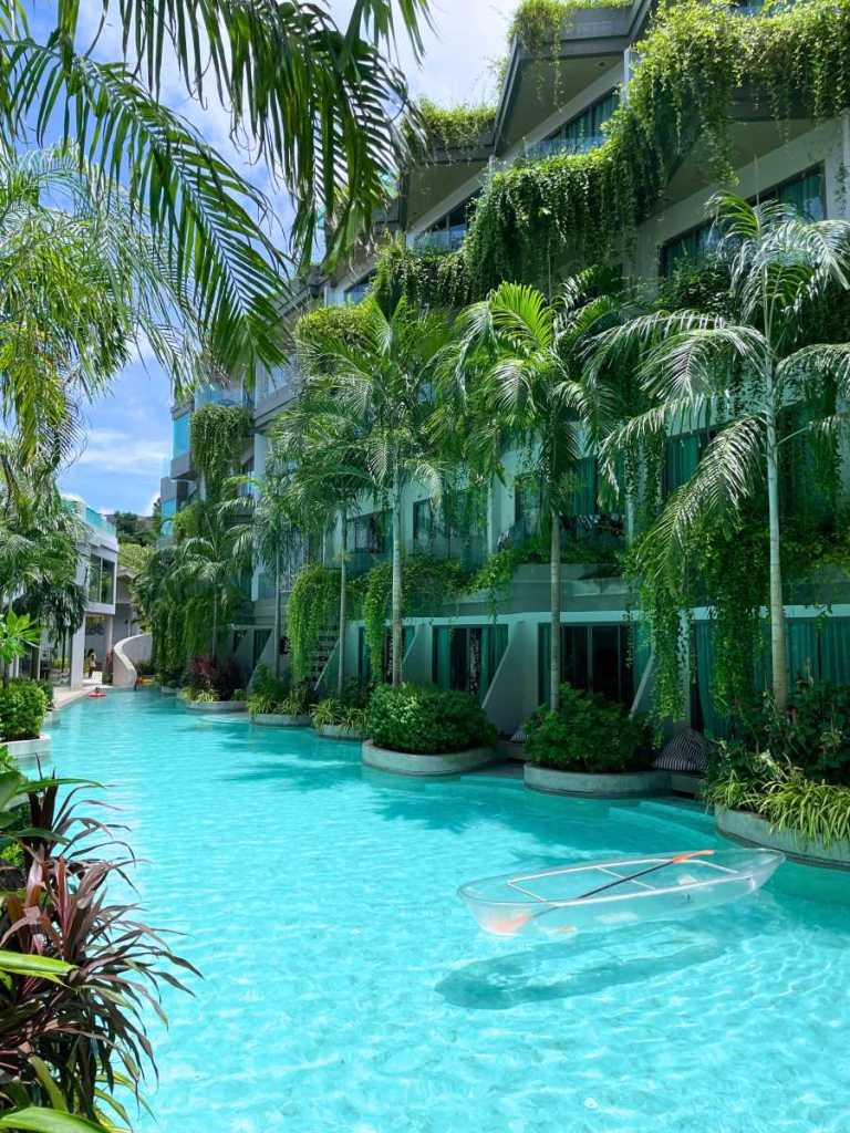 Transparent kayak floating on clear blue water at Panwaburi Beachfront Resort