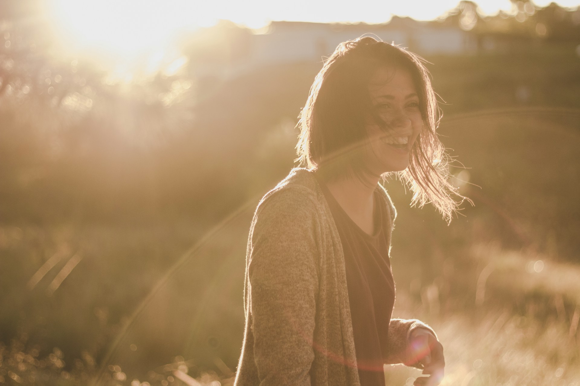 woman enjoying sunlight - Benefits of Sunlight for Skin