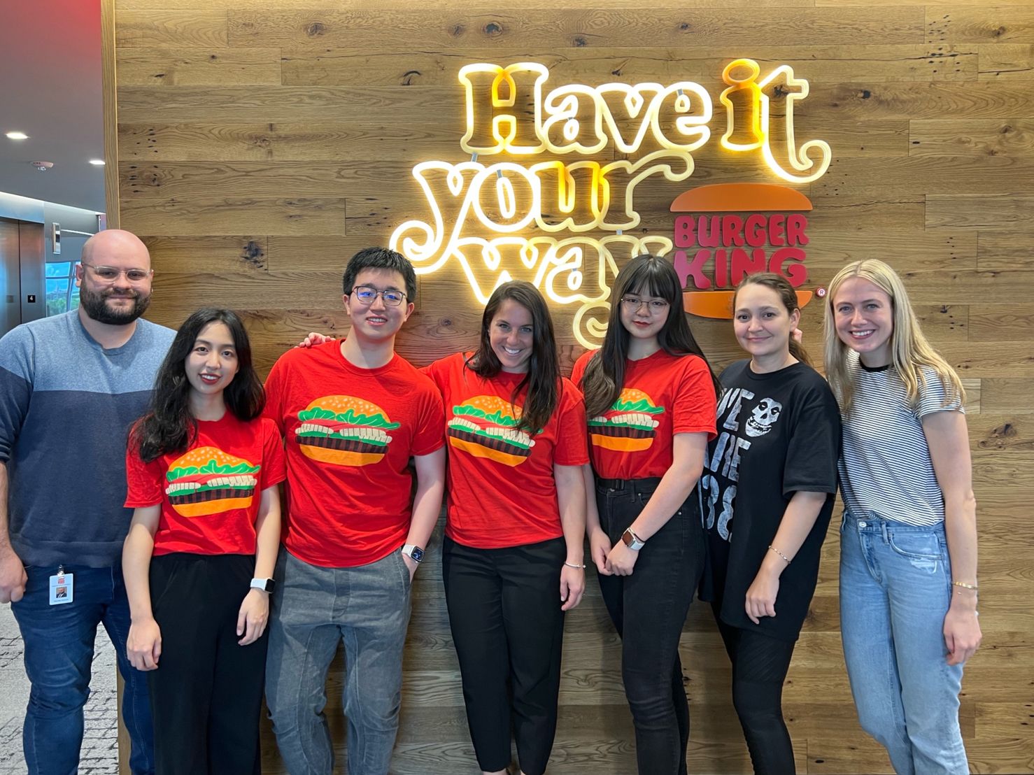 Branding collage for 'delivo' food delivery, featuring logo, slogan, merchandise, and app design.