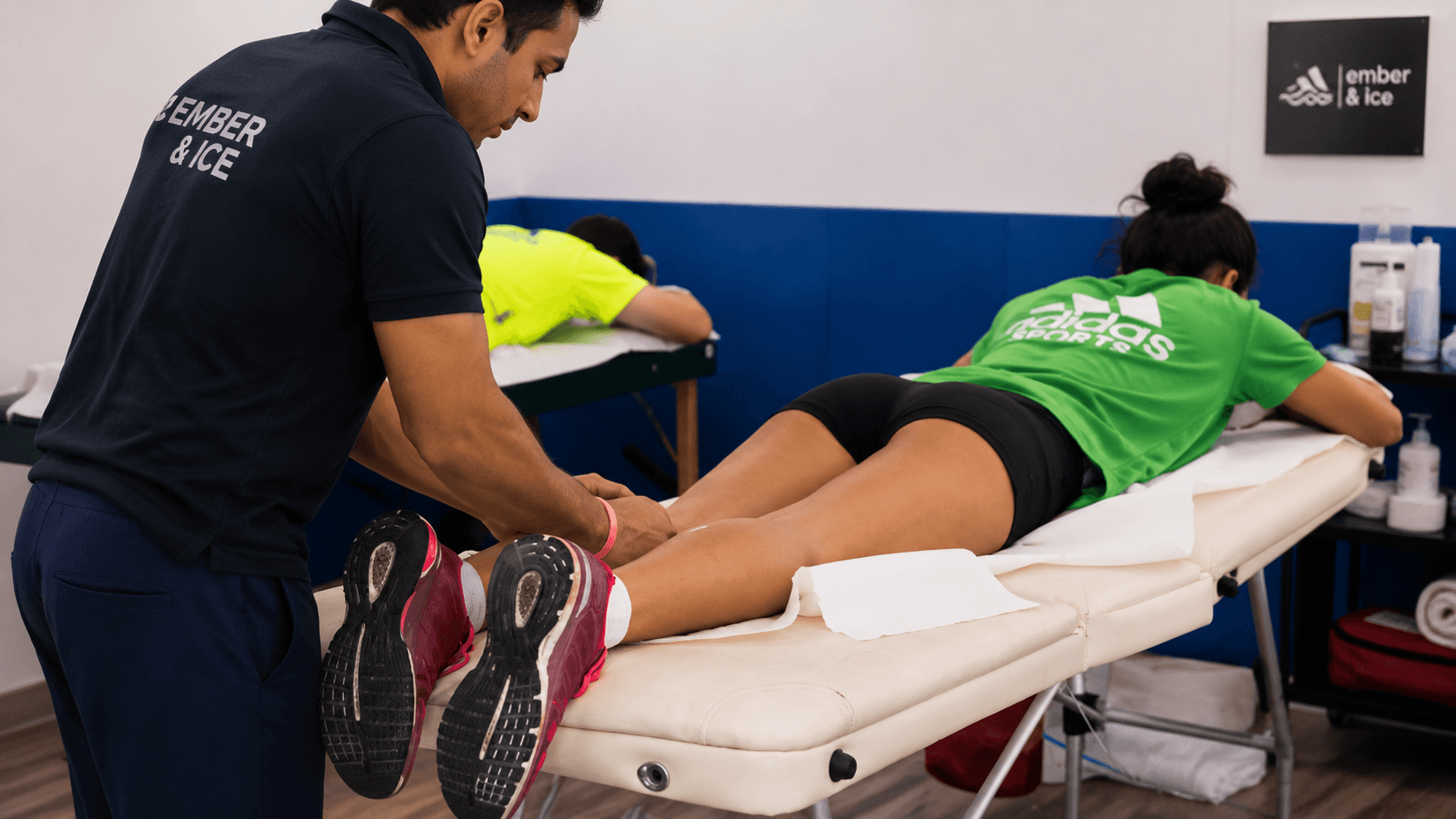 Client undergoing sports massage therapy for muscle relaxation and post-workout recovery at Ember & Ice Health in Bangalore.