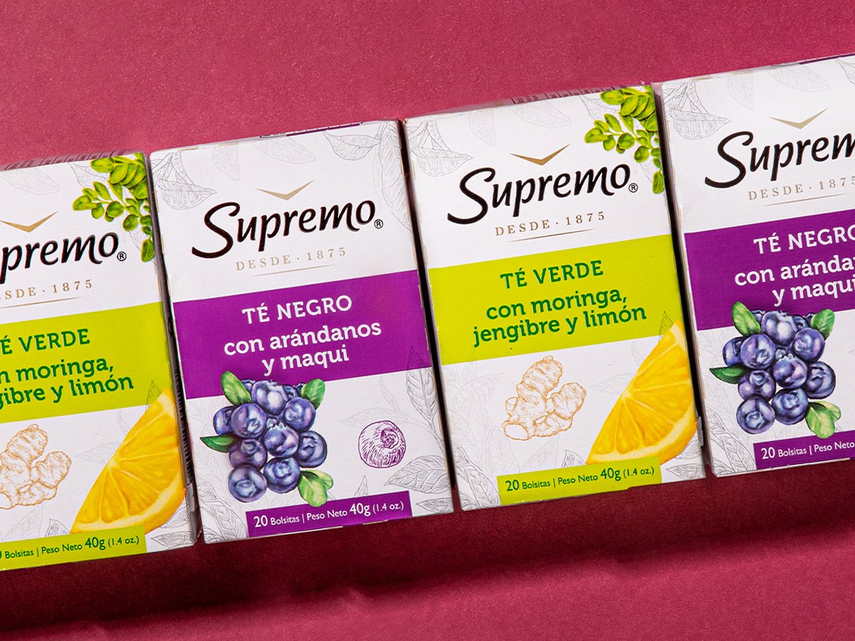 Rooftops of a coastal town with the sea in background