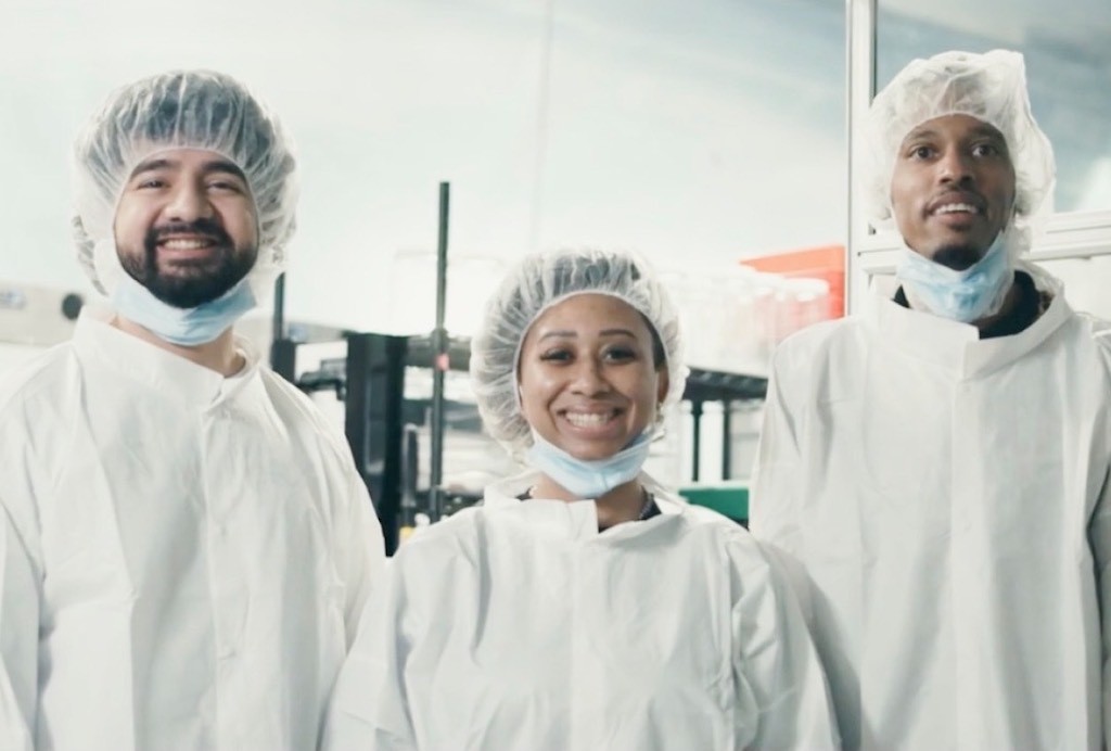 Two pharmacy employees inspecting inventory