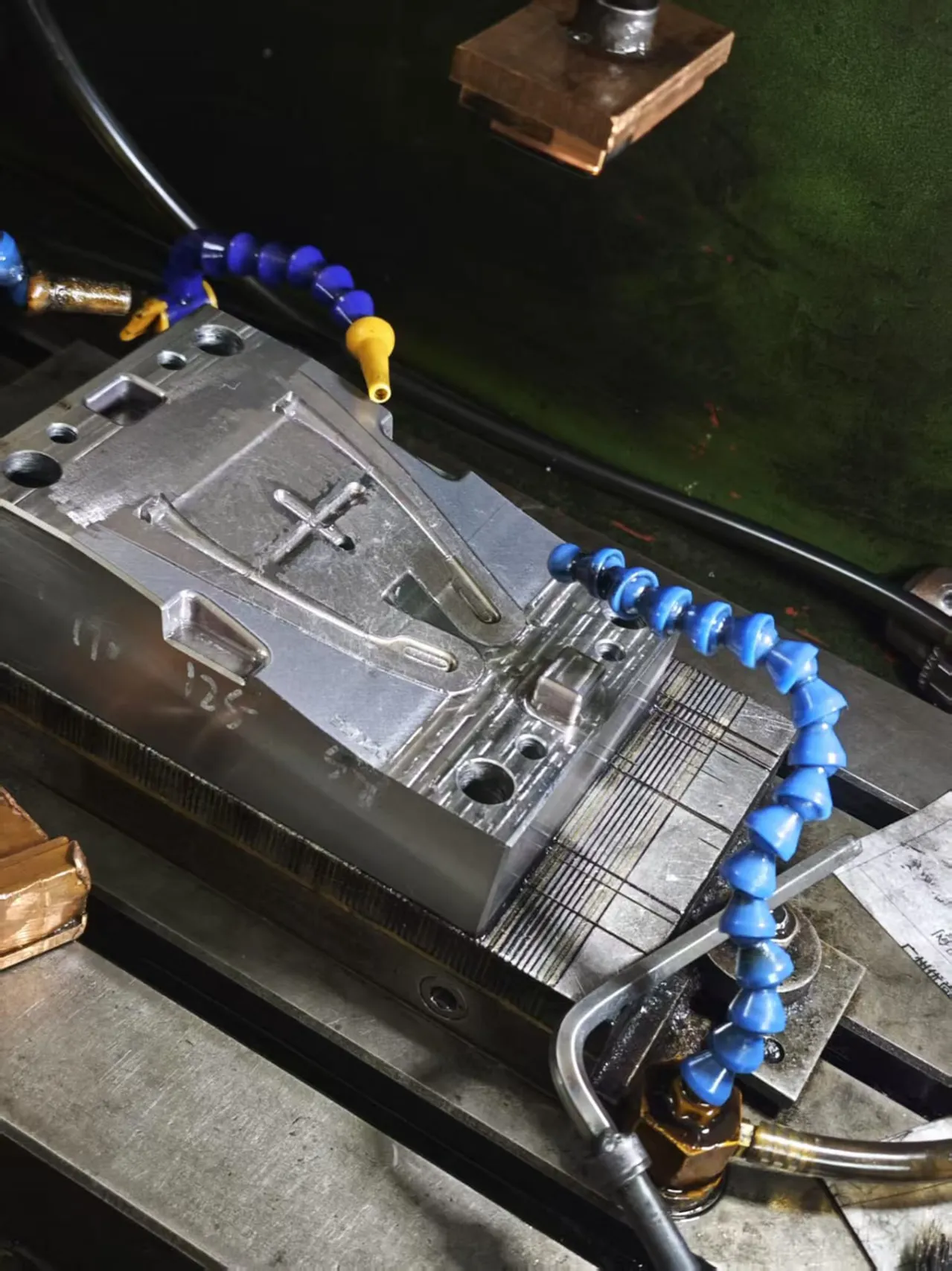 Manufacturing tooling and fixtures being tested on a production machine