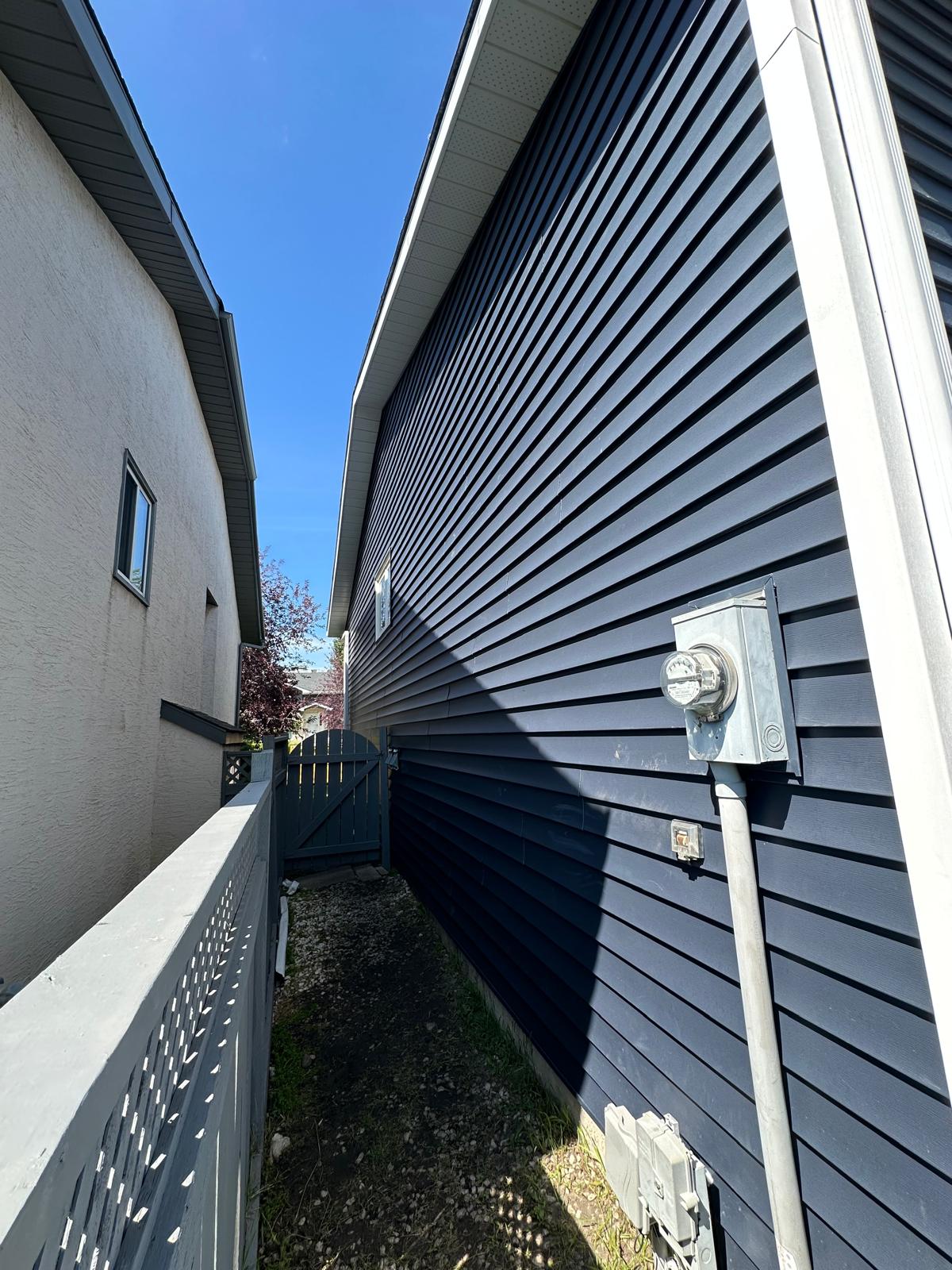 Vented aluminum soffit and fascia update for improved attic ventilation.