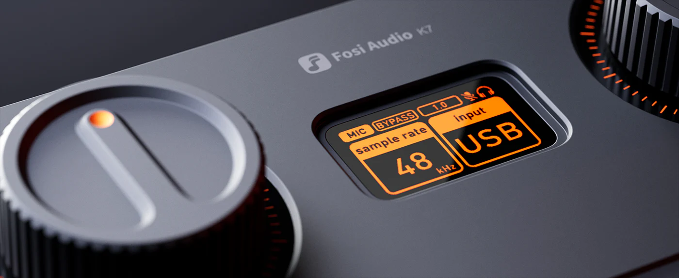 Close-up view of orange display on audio interface