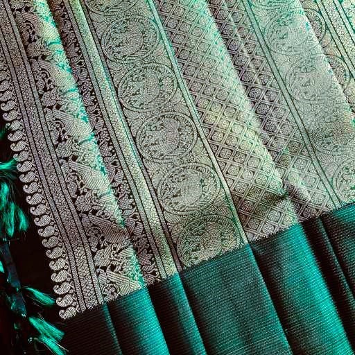 Maroon and Green Vairaosi Border Kanchivaram Silk Saree