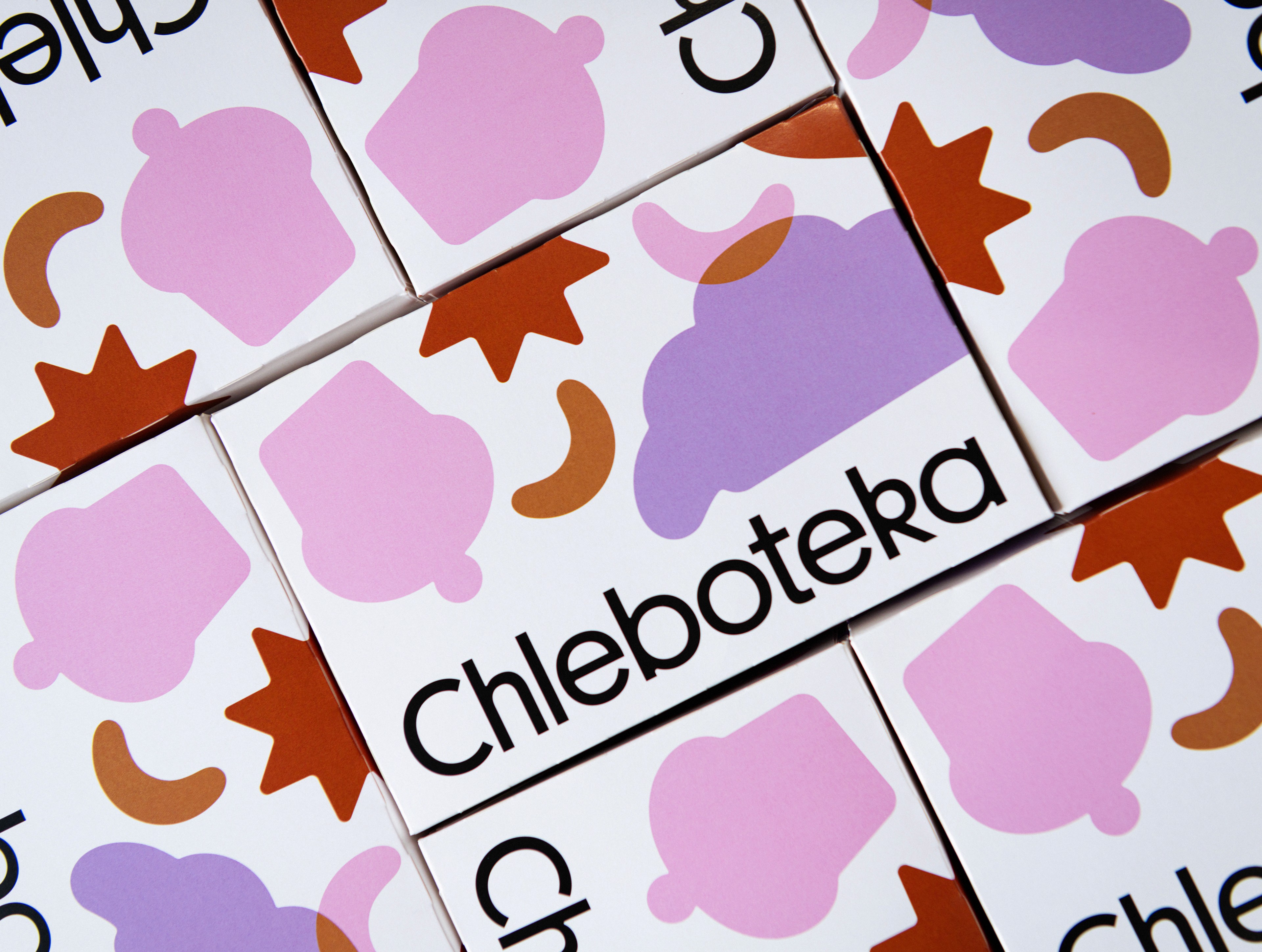 Chleboteka circular logo with heart and wheat symbol reading Piekarnia Cukiernia Delikatesy Bistro on a shop sign, logo design