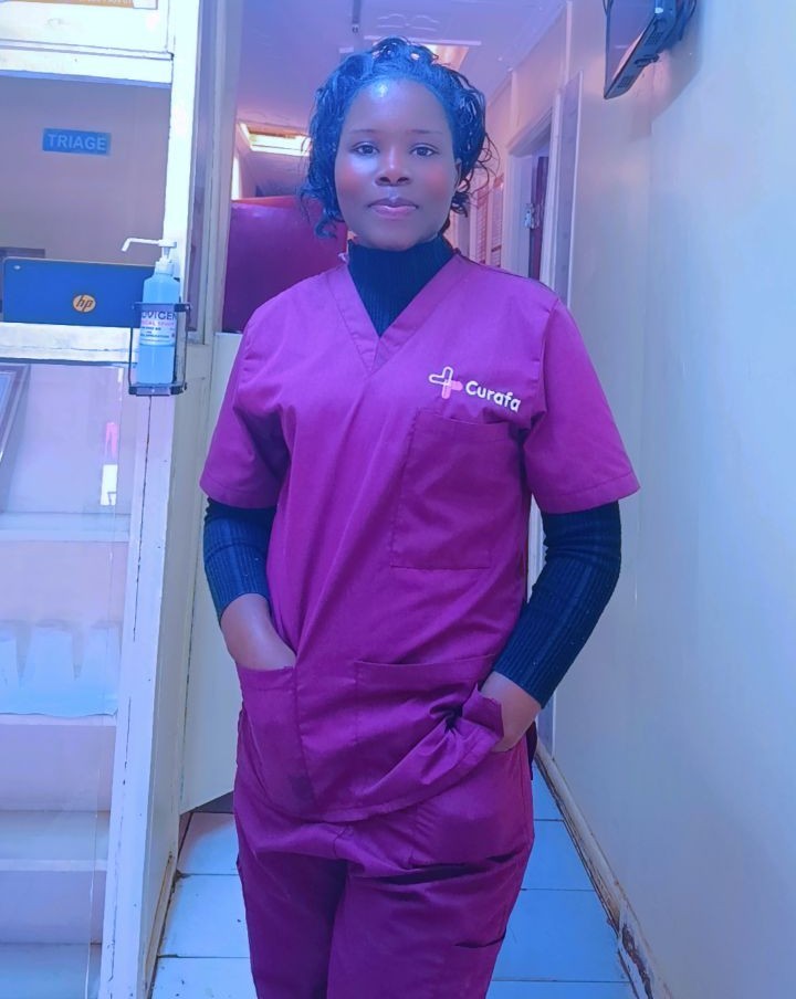 a woman wearing a white coat and a stethoscope