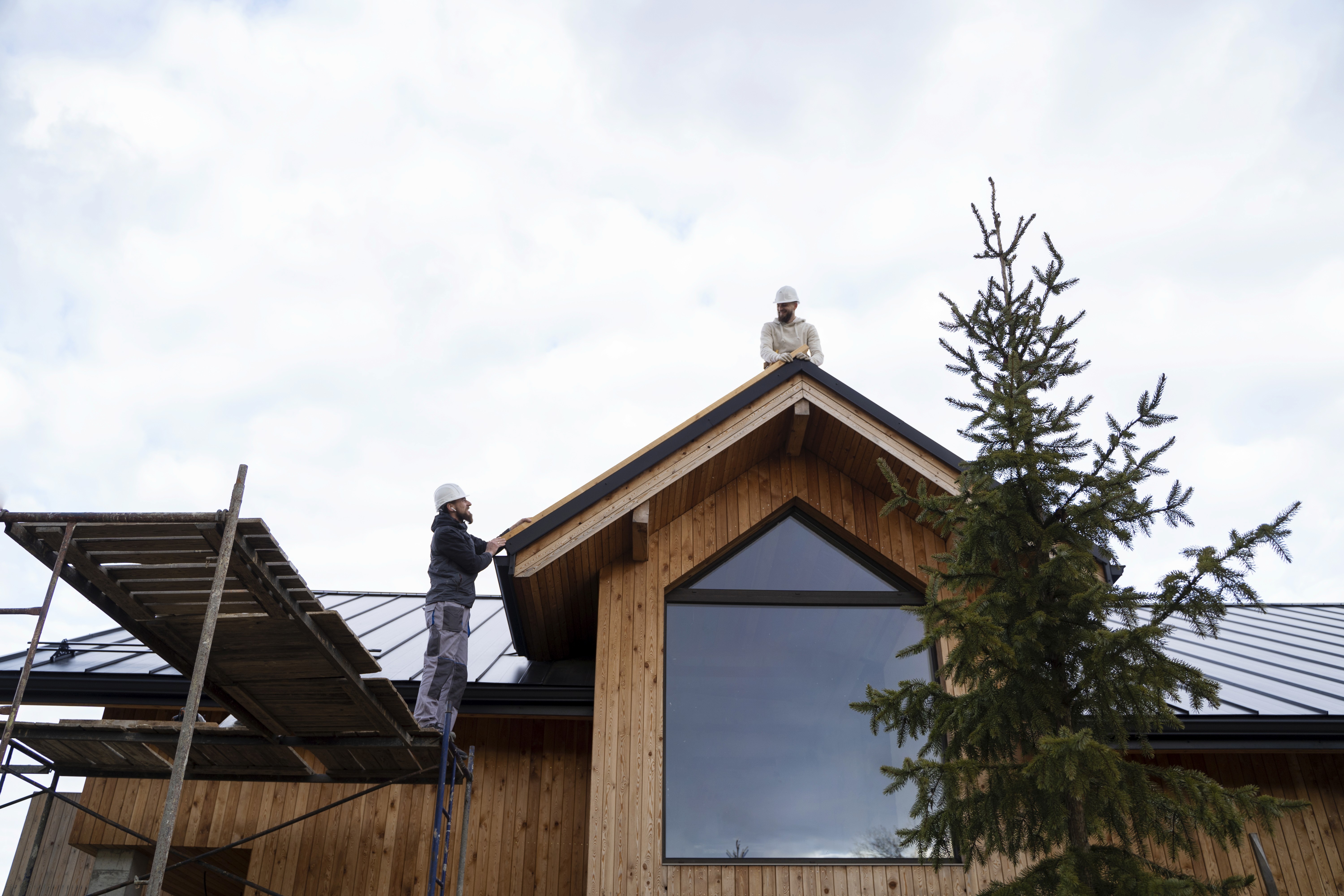 Professional roofers working on a residential property in Essex, part of a Click Boosters SEO case study showing lead generation growth for tradesmen.