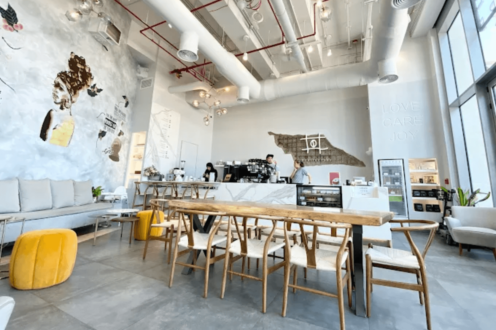 Cafe in Abu Dhabi with artistic wall murals at Coffee Architecture.