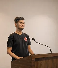 Bhavya Pandya Public Speaking at Tech Event - Sharing Knowledge and Community Engagement