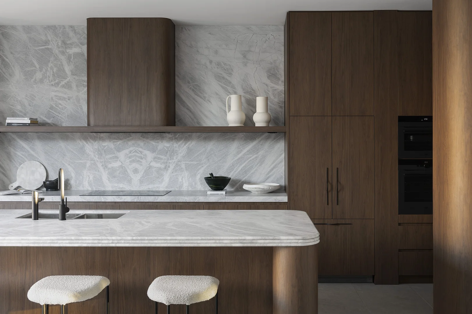 Brand new modern kitchen with stone splashback and benchtops showing contemporary styling by Swoon