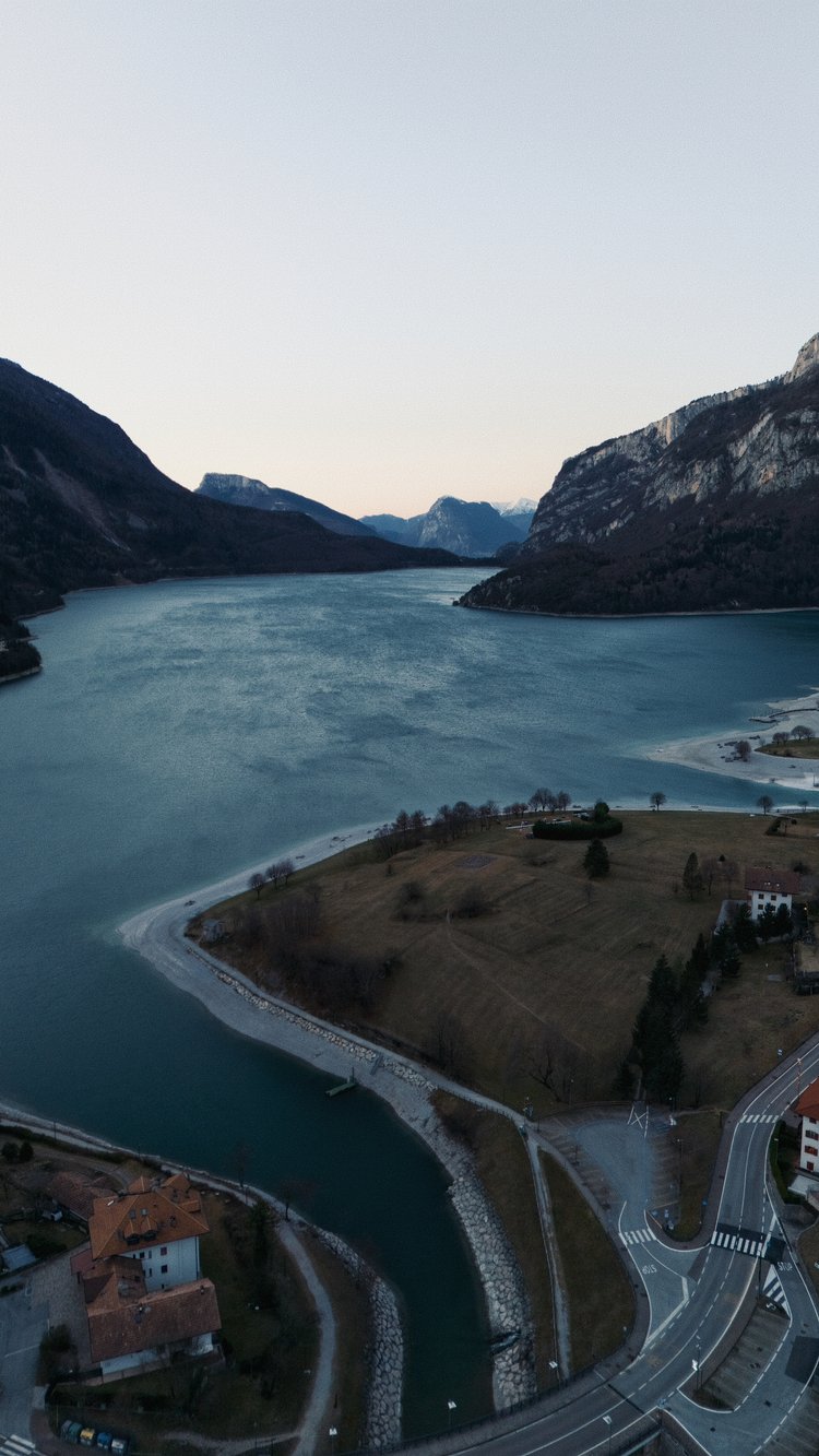 A breathtaking aerial view capturing an IISA-sanctioned event, with swimmers navigating the harsh, icy environment.