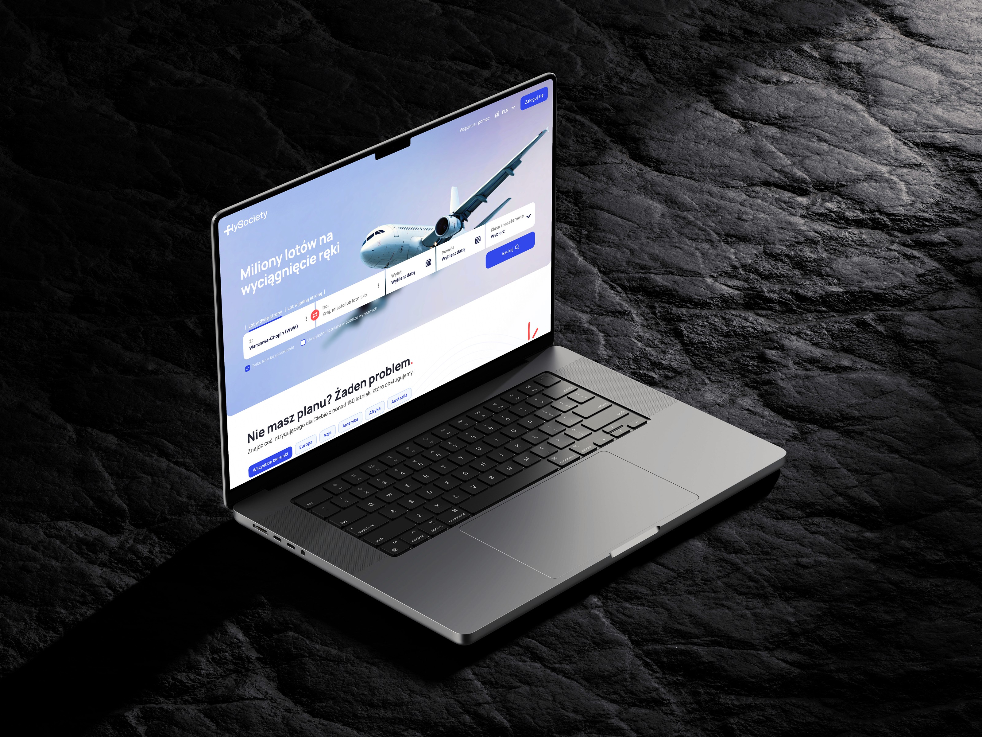 FlySociety flight search website displayed on a MacBook Pro mockup, showing the hero section with airplane and search form, placed on a dark textured stone surface