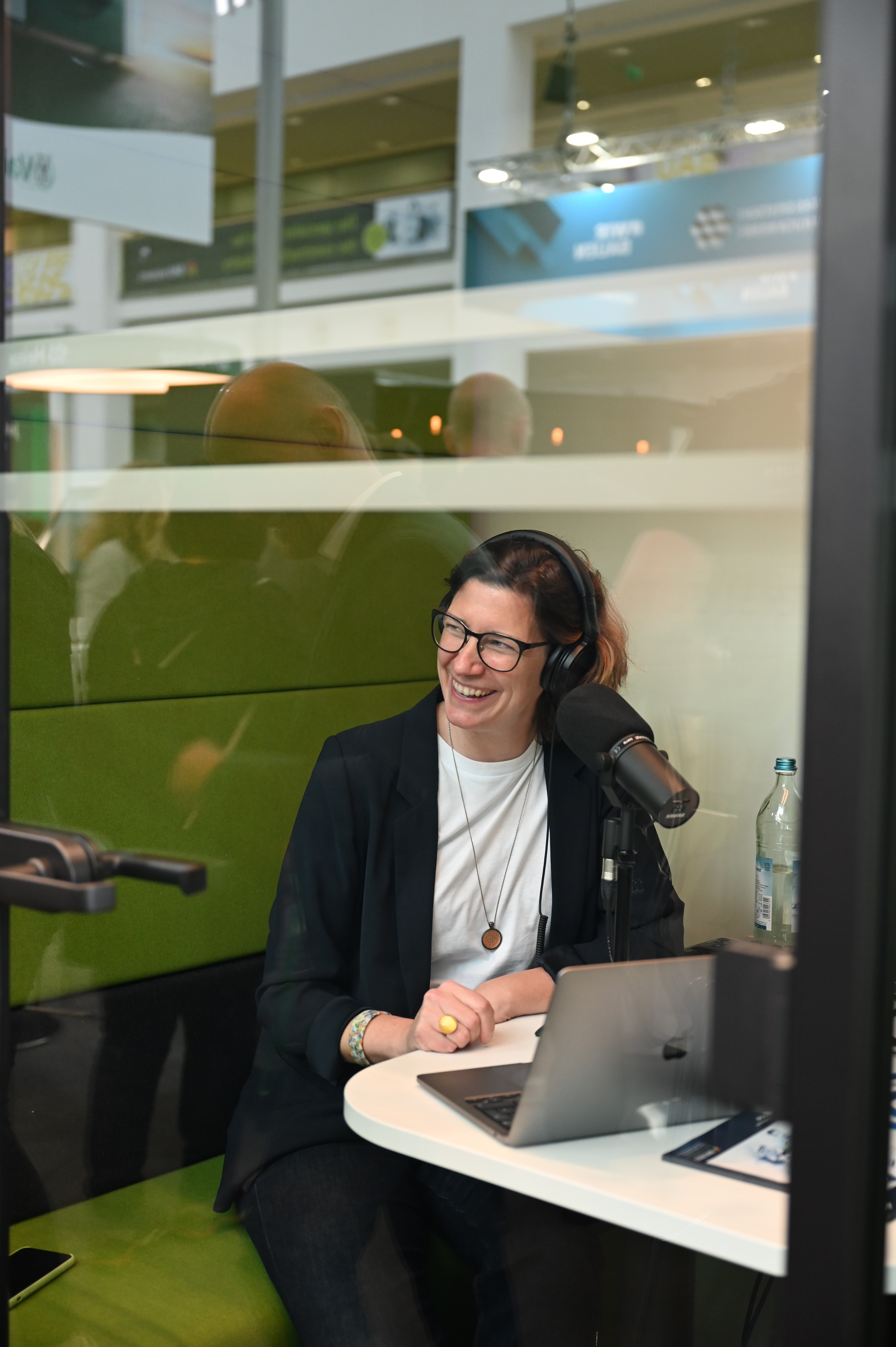person sitting in a chair in front of a man