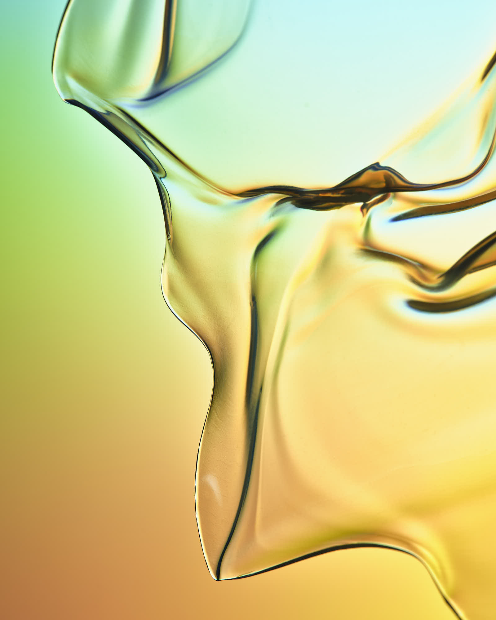 Abstract fluid art with vibrant translucent shapes and soft gradient background.