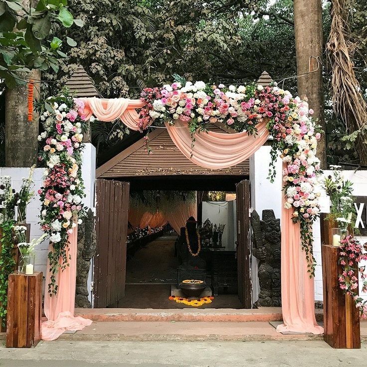 Wedding entrance decoration with peach drapes & pastel flowers at gate in Vaishali, Keshav Puram, Okla, West Delhi & Gurgaon