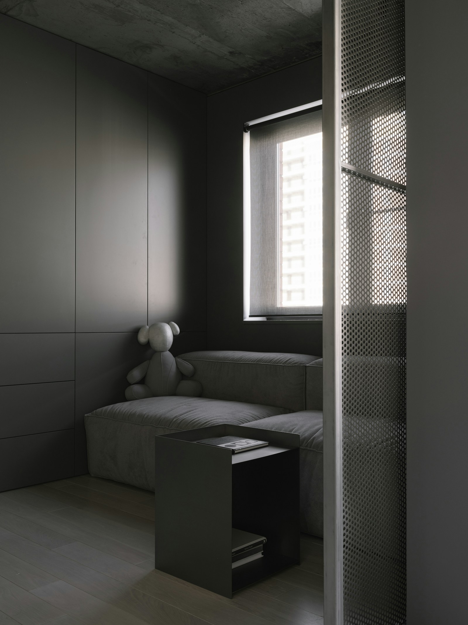 A room with a couch and a window — editorial interiors image 2 for "Borrowed Light"