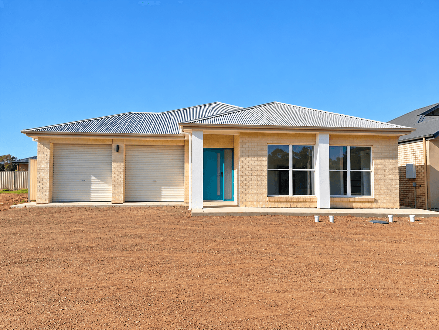 A Family Home with a Teal Front Door in Crystal Brook