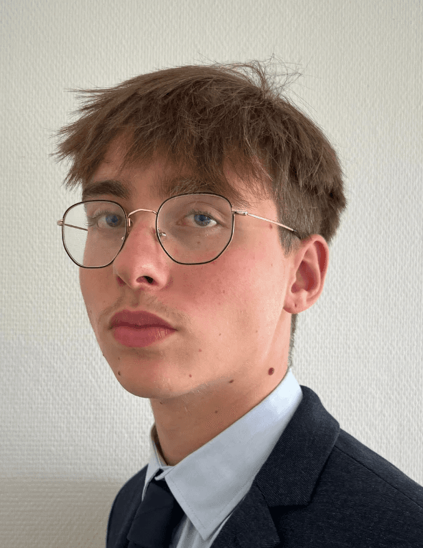 a woman with an afro is looking at the camera