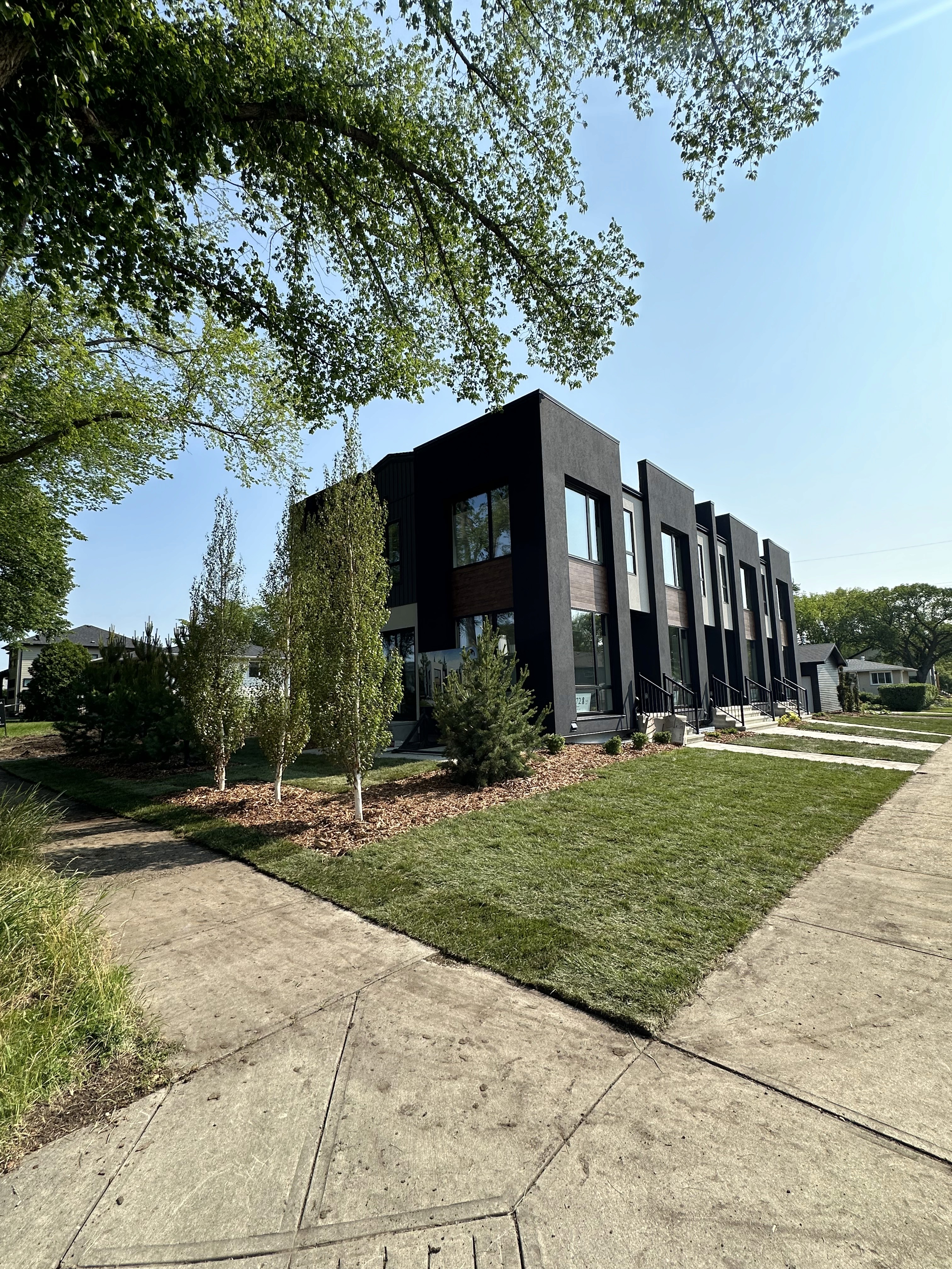 Beautiful landscaped garden with greenery and outdoor design elements.