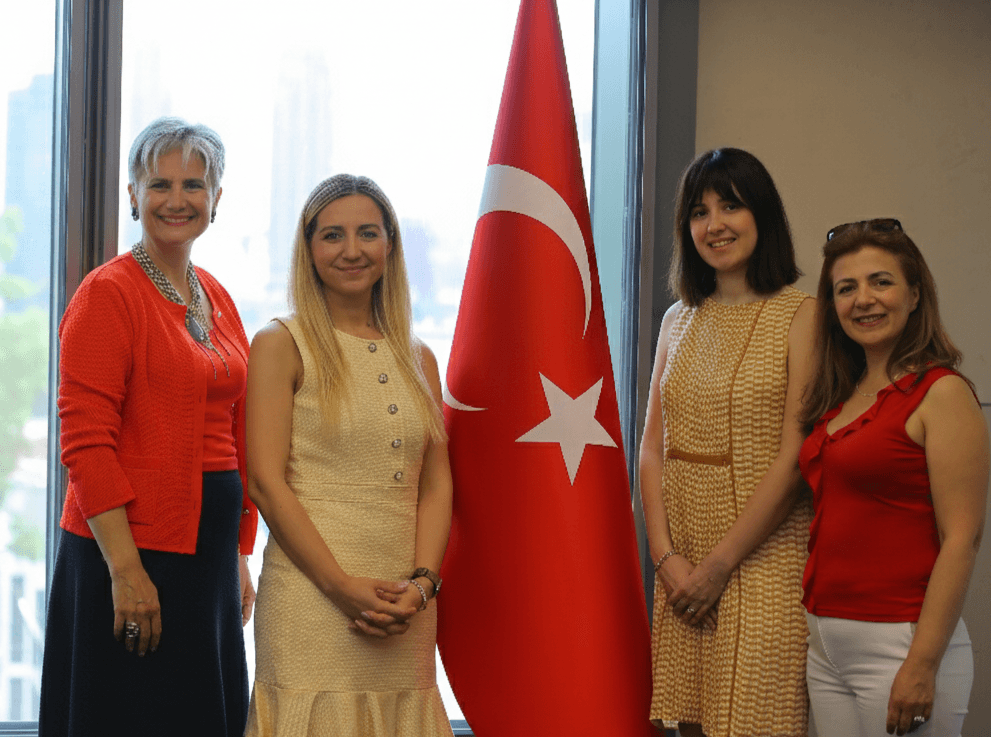 people laughing and talking outside during daytime