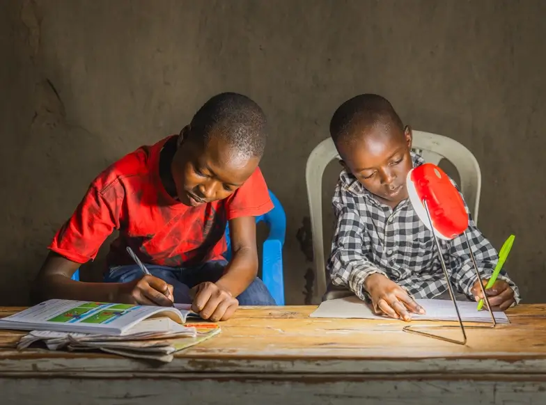 Two children doing schoolwork