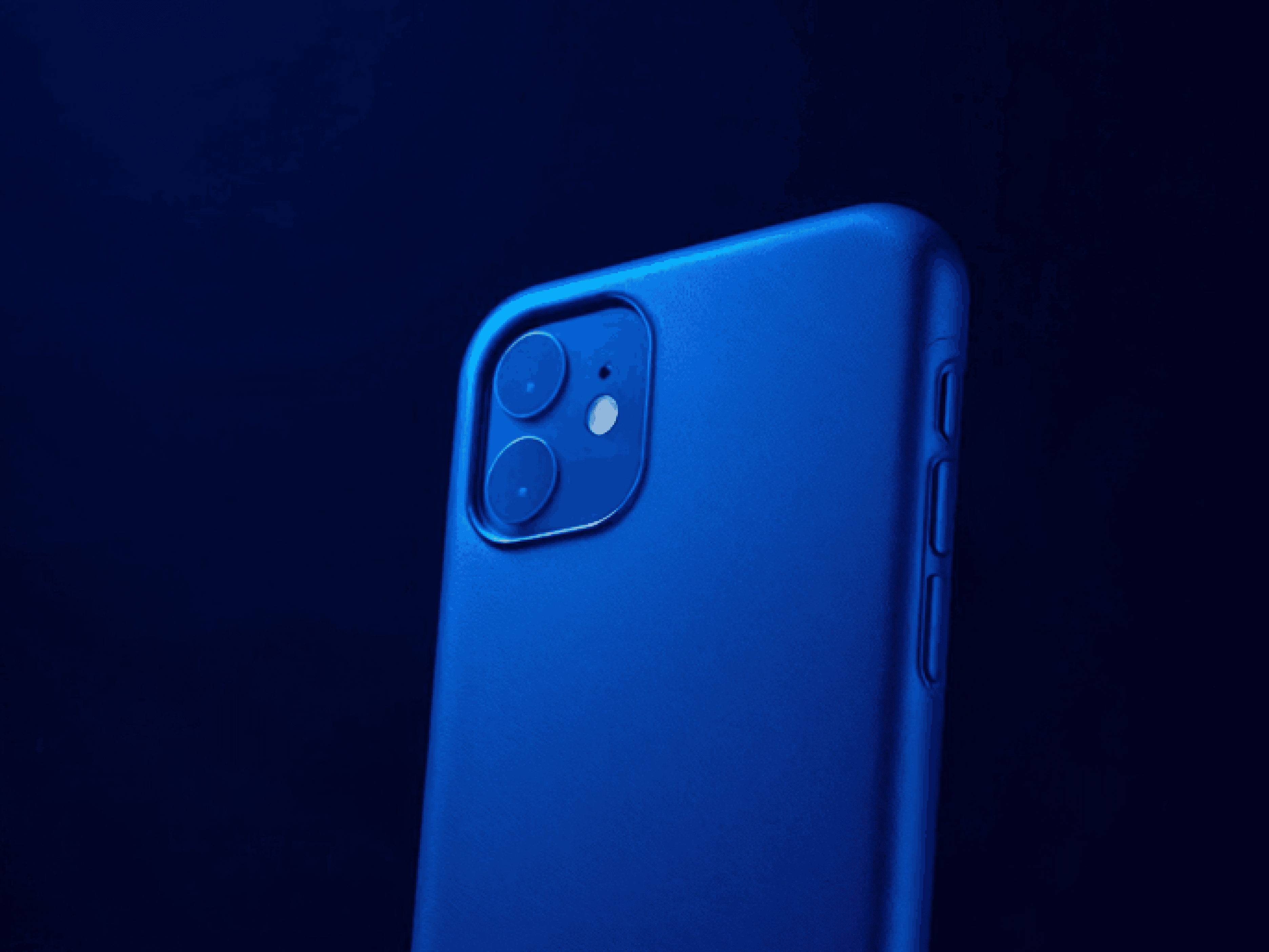 Rear view of a blue-cased iPhone with dual cameras on a dark blue background