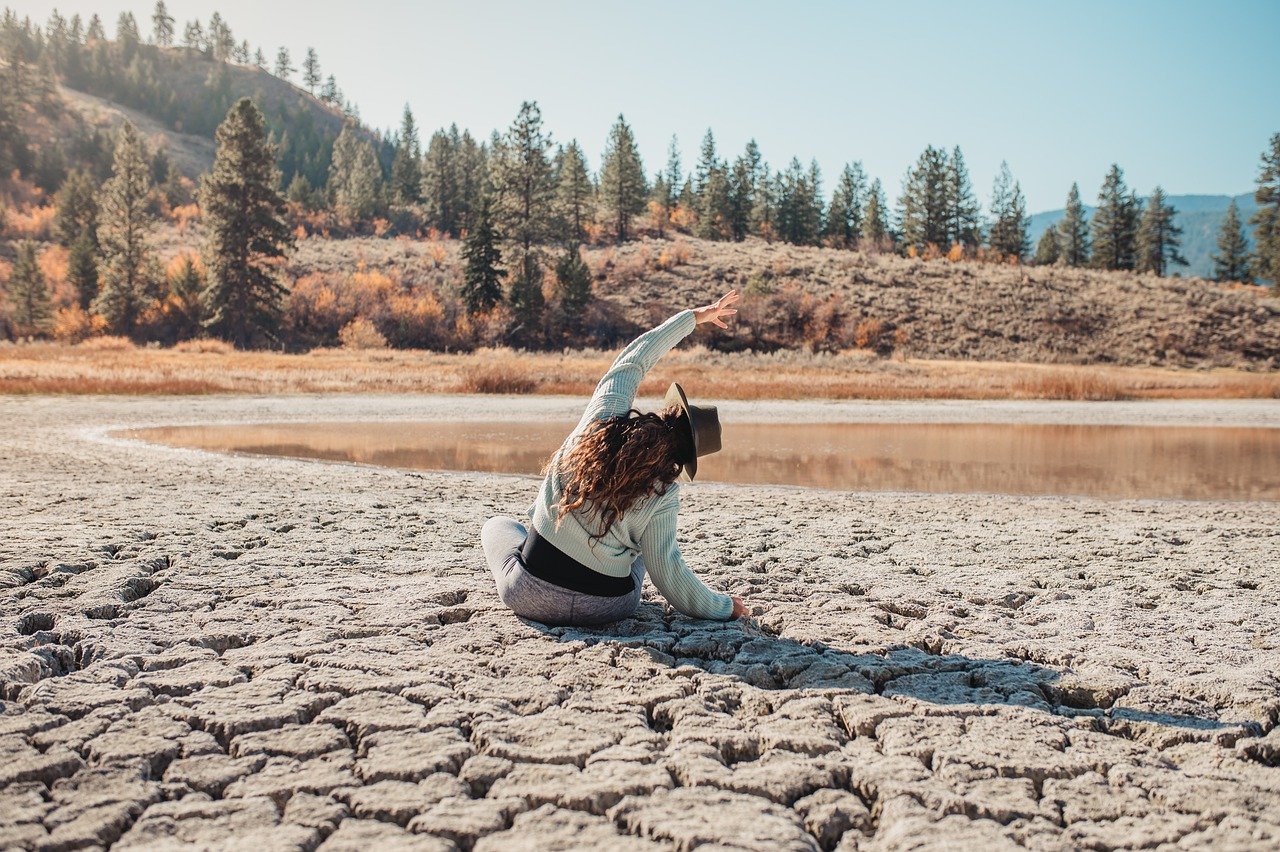 women doing yoga on a dry land, heso blog image