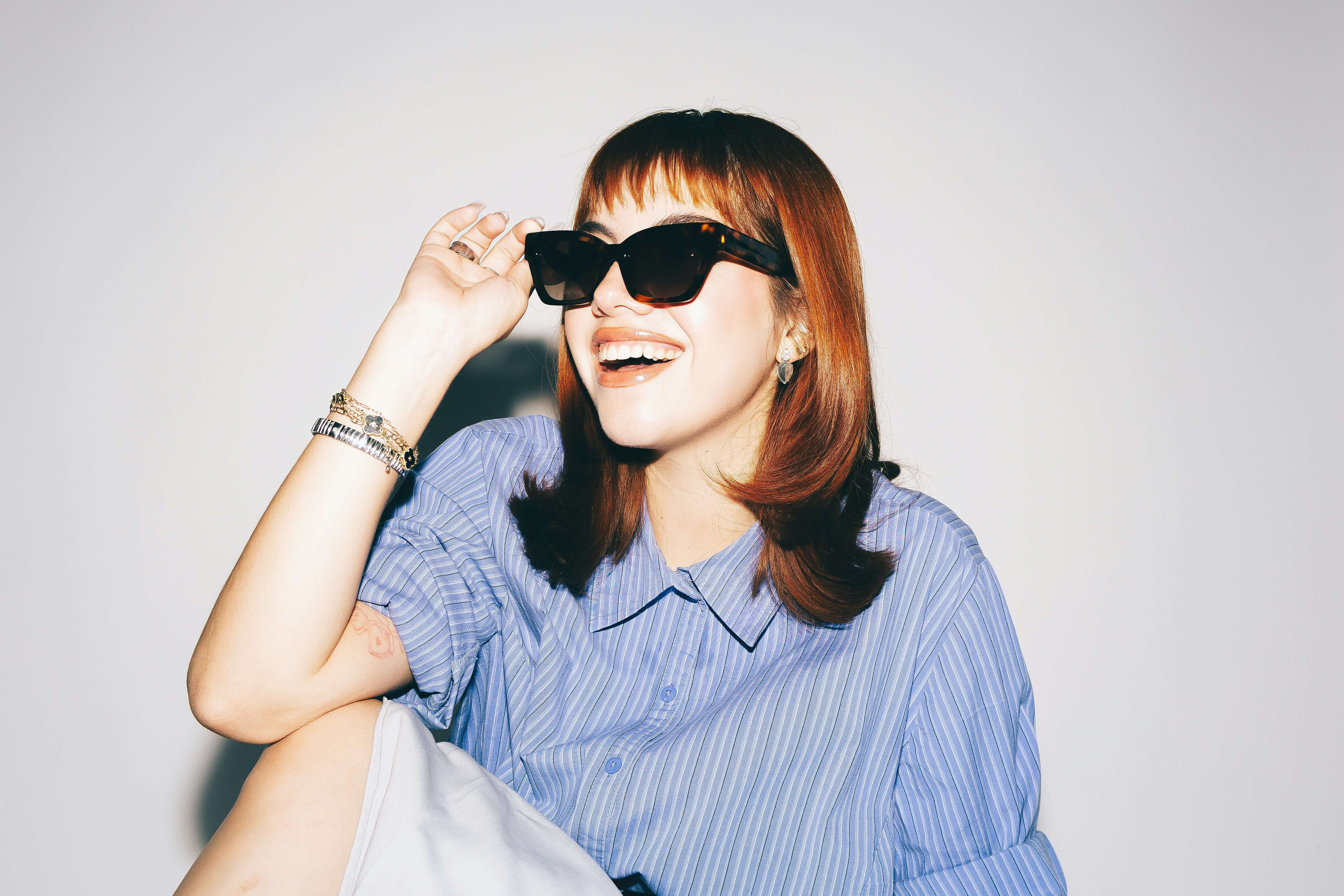 woman in sunglasses profile image