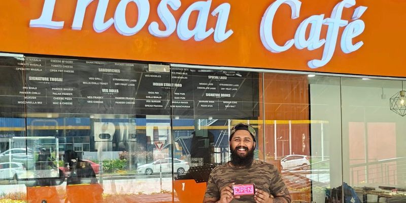Mithun in front of his first store in The Curve, Mutiara Damansara.