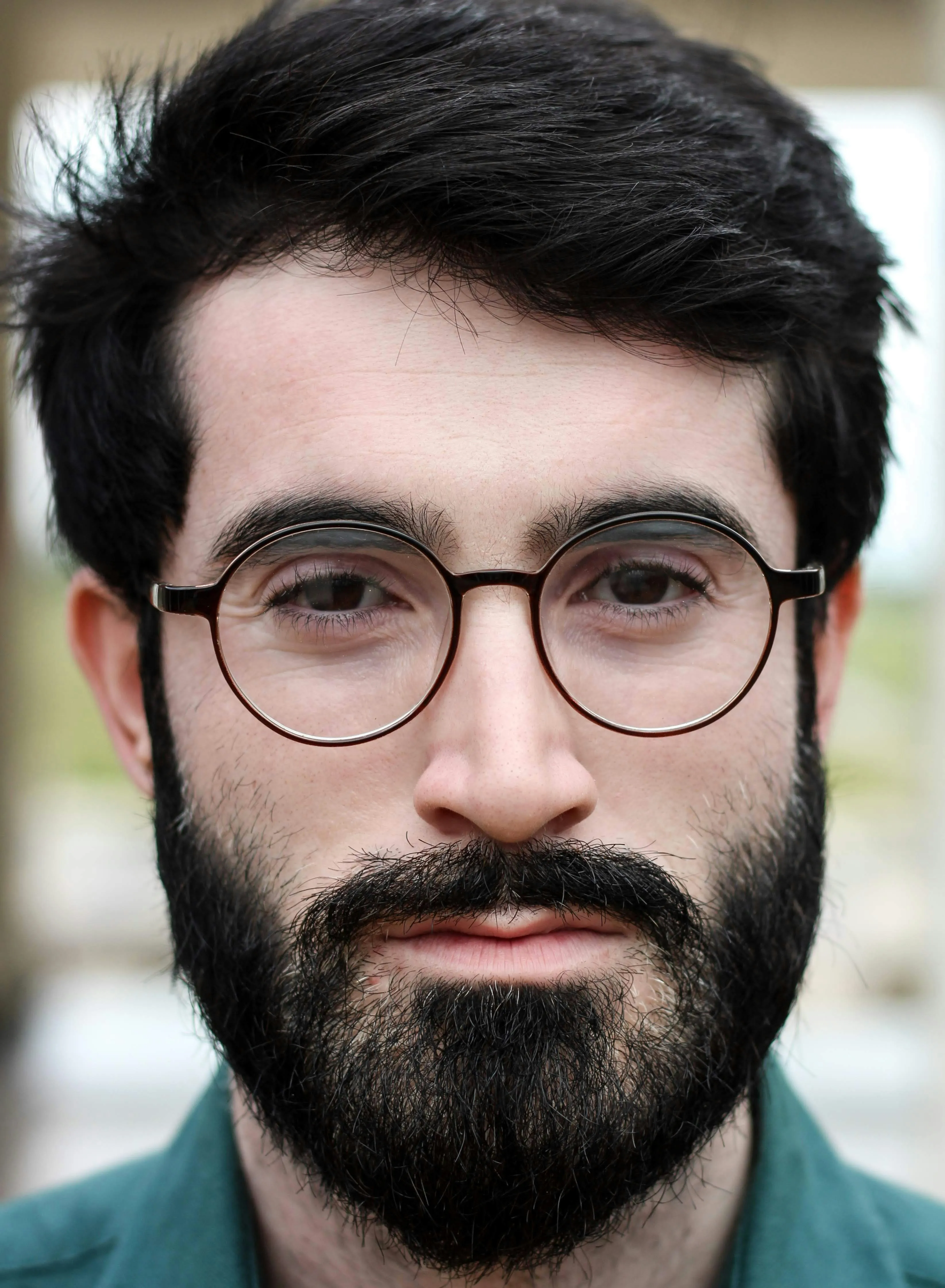 A close up of a person wearing glasses
