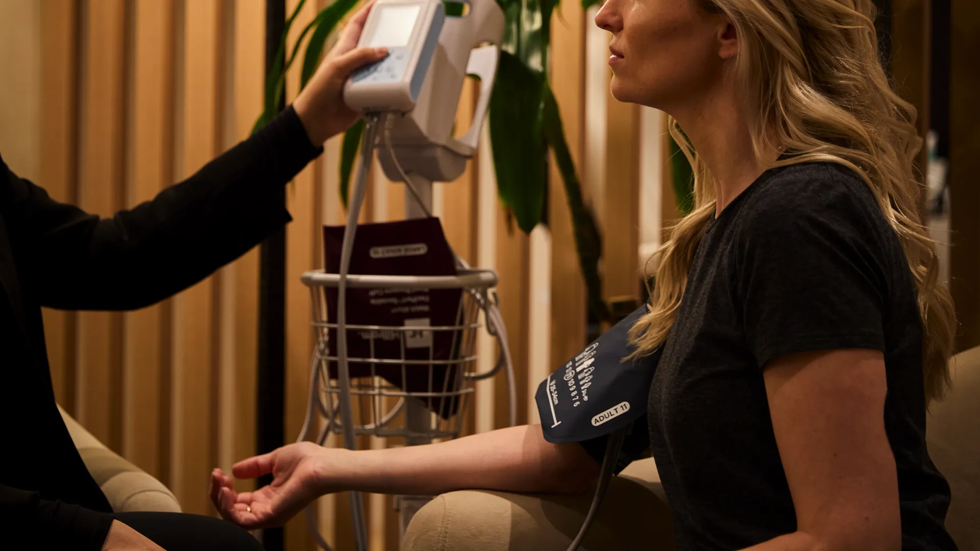 Doctor consulting with a Biograph member during an executive physical focused on preventive health and early disease detection.