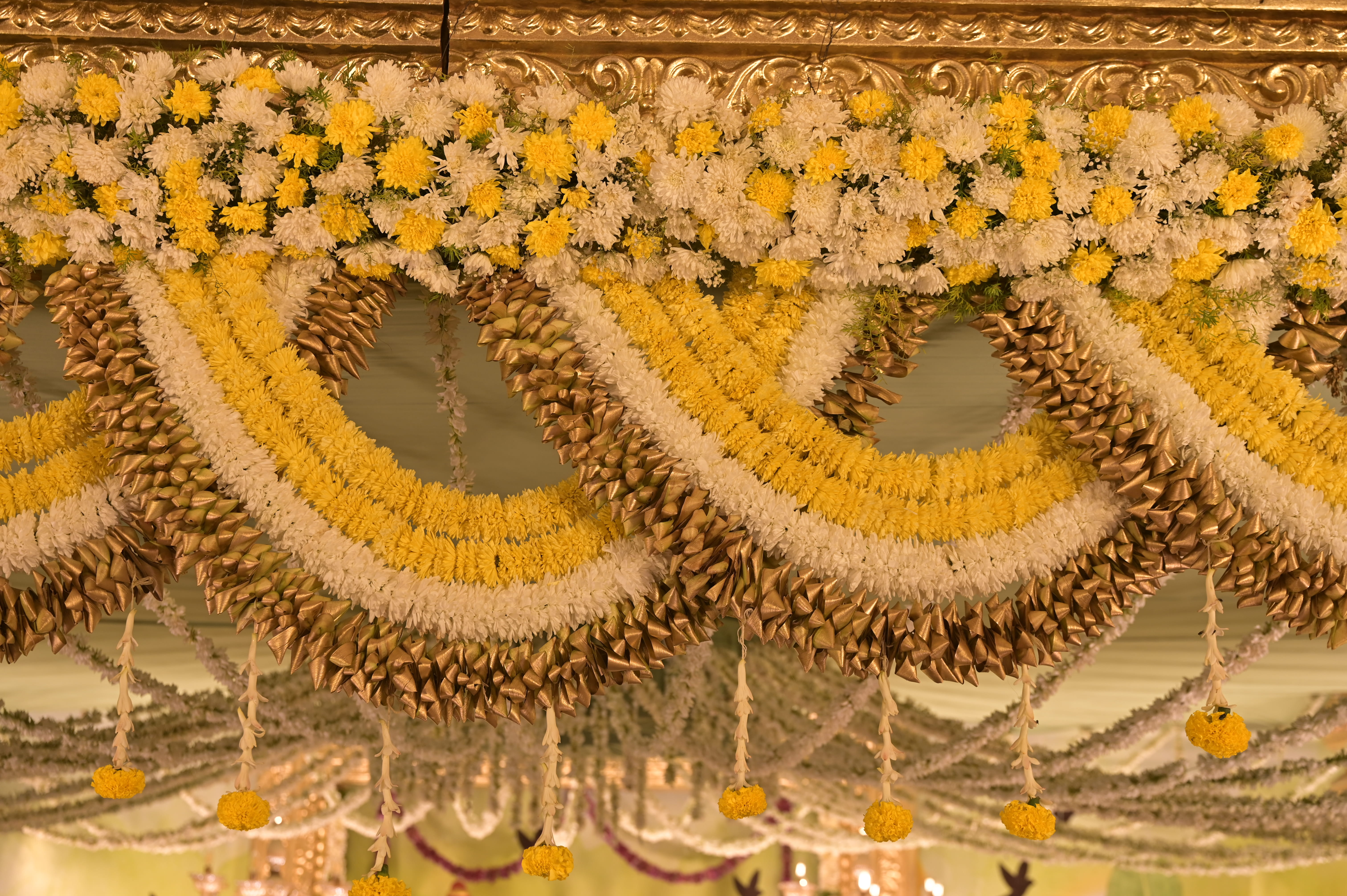Wedding stage and mandap decor with floral and lighting arrangements, styled and captured by Wow Makers in Hyderabad, India