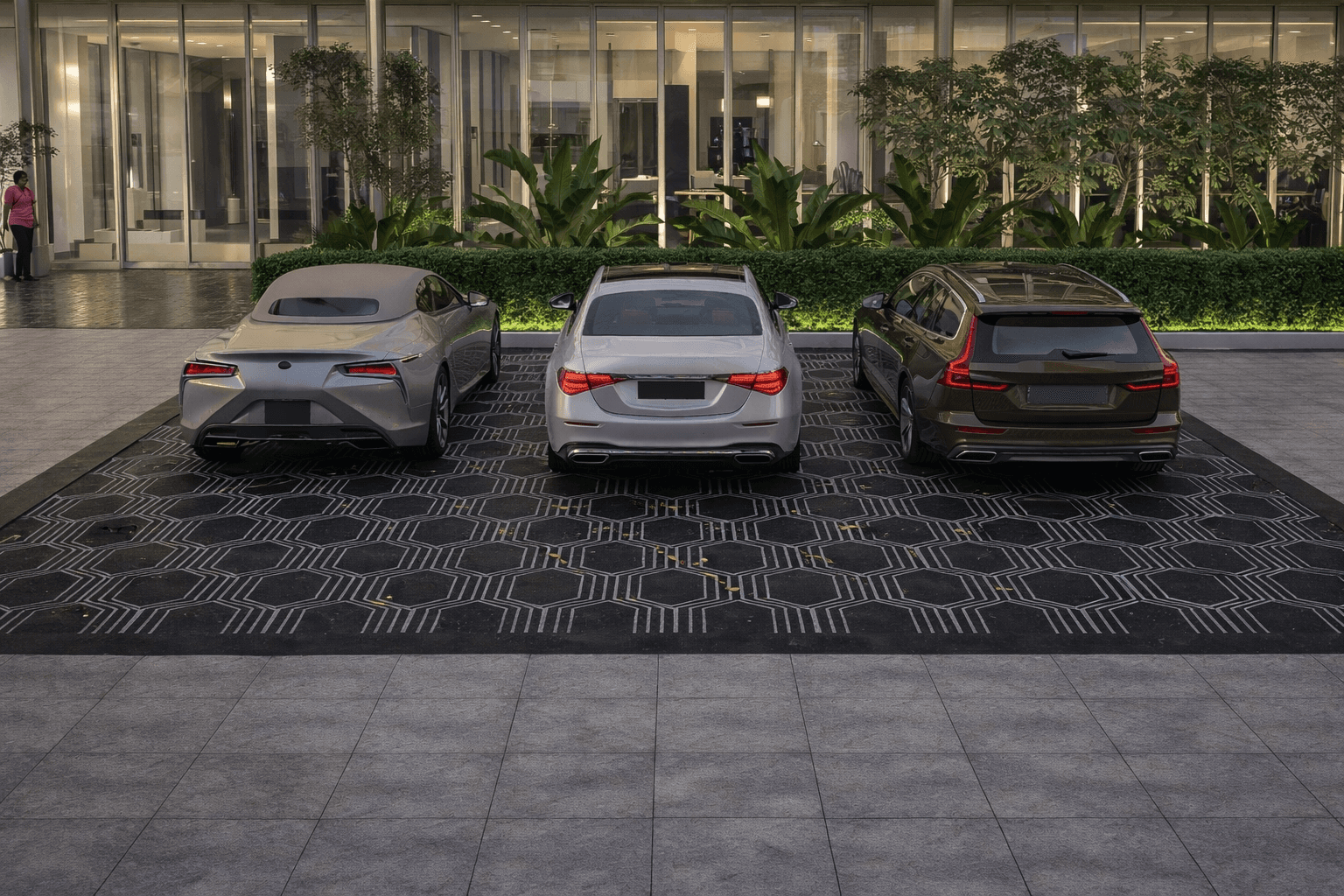 Granite paving system with modular pattern installed in residential driveway