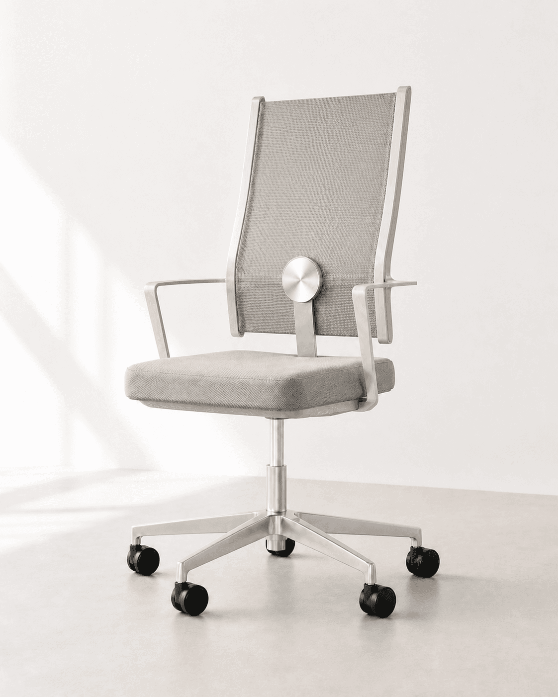 Pivot Office Chair, a pale-ash and light-grey seat on a five-caster aluminium base, photographed in a bright white studio
