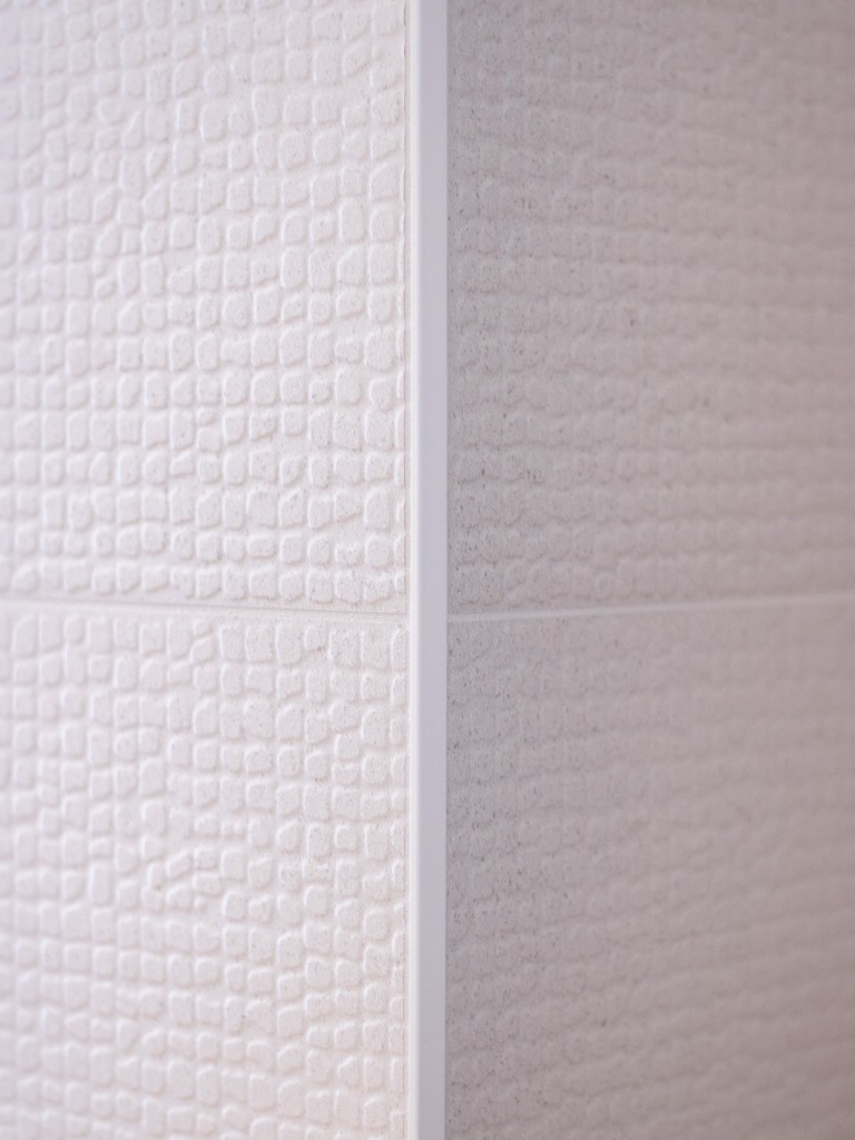 Image of Texture and pattern of white and grey tiles for interior design and home renovations by KHD Homes.